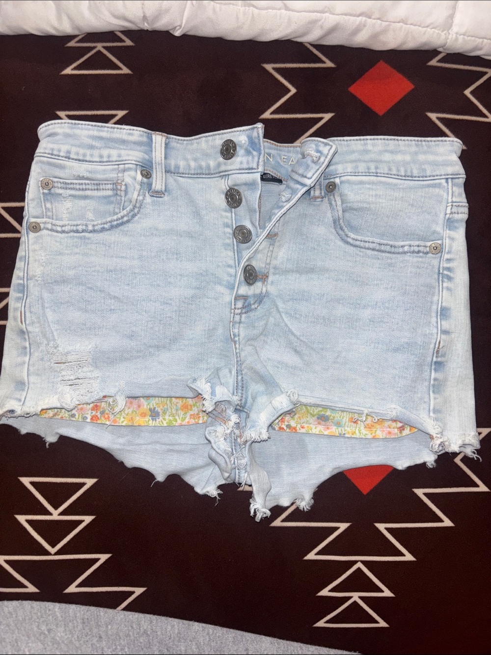 AE Light Wash Denim Cutoff Shorts with Floral Pockets